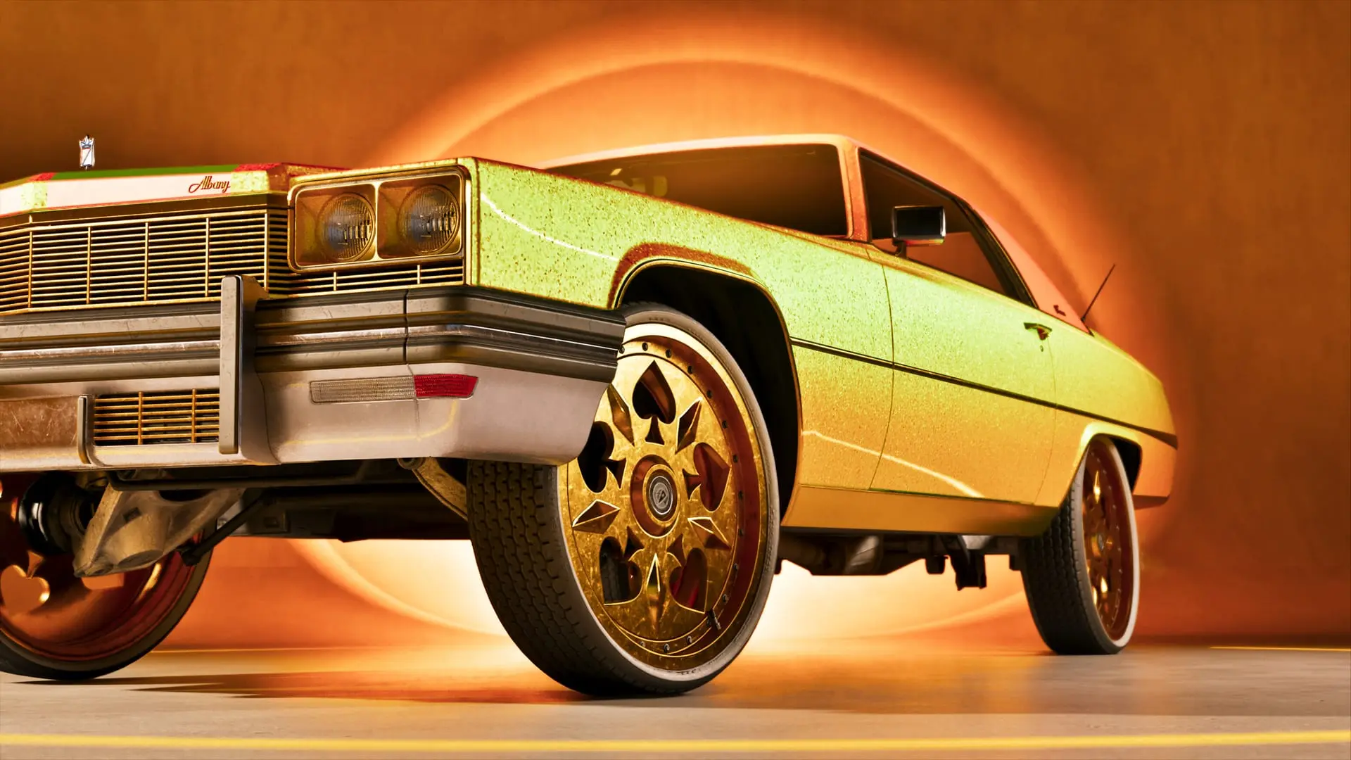Gold-plated lowrider sedan with card-suit wheels against a glowing orange background.