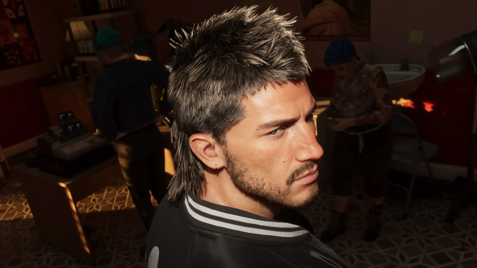 Close-up of a man with a spiky mullet and black bomber jacket inside a barbershop.